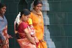 Women at the exit of prayer in Tamil temple, Matale, Sri Lanka Ceylon.