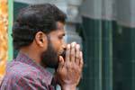 Man of Tamil origin, clasped hands, Muthumariamman Temple, Matale, Sri Lanka Ceylon.