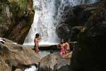 Swimming in the waterfall to Ramboda Falls, PBC Highway, Horton plains, Sri Lanka Ceylon.