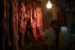 Hanging pieces of meat, Market Nuwara Eliya, Sri Lanka Ceylon.