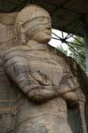 Buddha standing in an unusual posture, Gal Vihara, Polonnaruwa, Sri Lanka Ceylon.