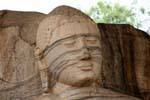 Buddha face with painful expression, Gal Vihara, Polonnaruwa, Sri Lanka Ceylon.