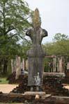 Statue back view to the Terrace of the Tooth, Polonnaruwa, Sri Lanka Ceylon.