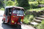 Tuk-tuk on mountain road, Central Province, Sri Lanka Ceylon.