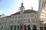Arcades and clock of the Town Hall, Lausanne, Switzerland.
