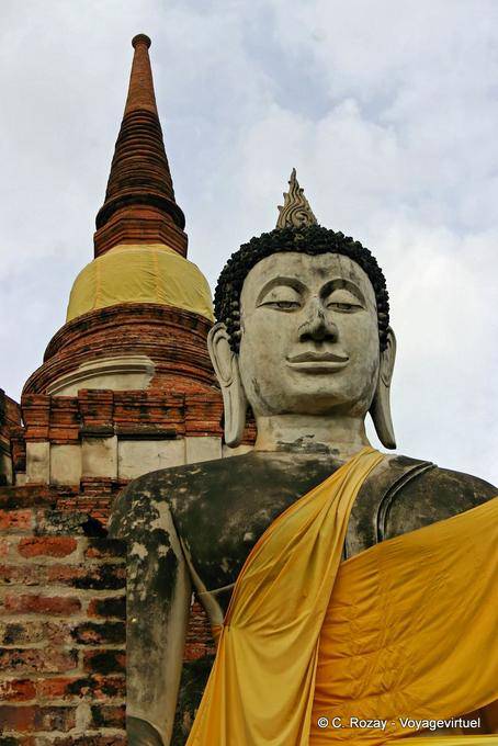 Buddha at the foot of the Great Stupa, Wat Yai Chai Mongkol, Ayutthaya - Thailand