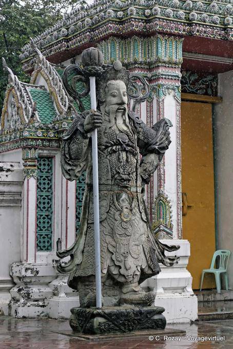 Giant statue standing guard, Wat Pho (Wat Phra Chettuphon), Bangkok - Thailand