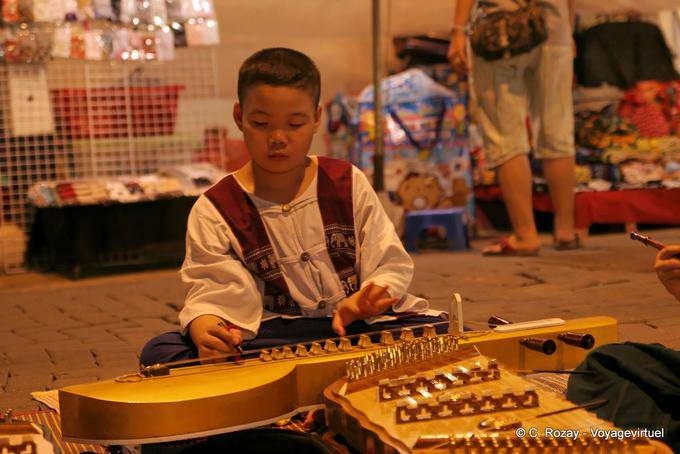 Boy playing Jakhe, Chiang Mai - Thailand
