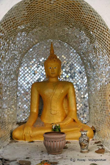 Suan Dok, a Buddha in a niche mirrors, Chiang Mai Temple - Thailand