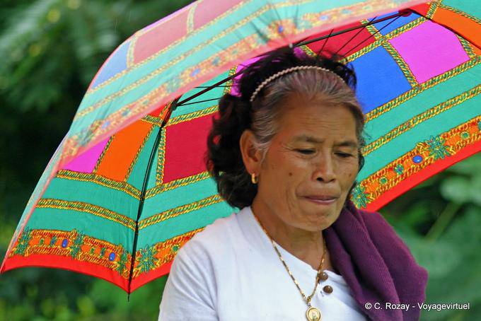 Passante with an umbrella, Chiang Mai - Thailand