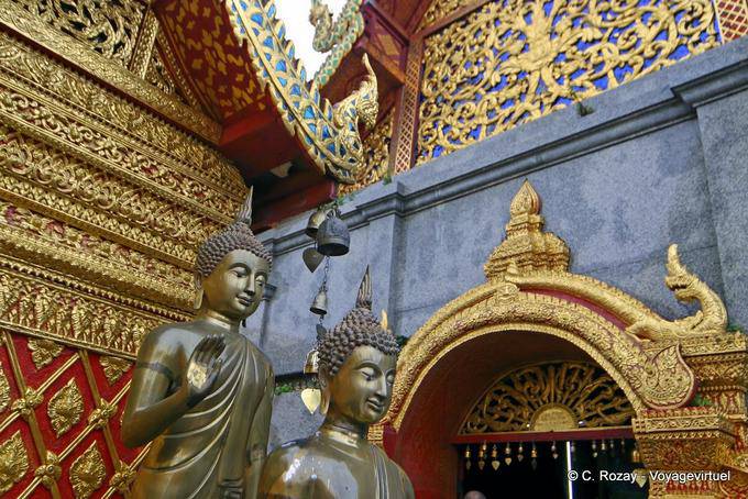Buddhas statue with flame of enlightenment, Wat Doi Suthep, Chiang Mai - Thailand