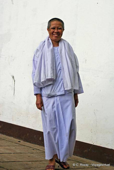 A smiling nun, Wat Doi Suthep, Chiang Mai - Thailand