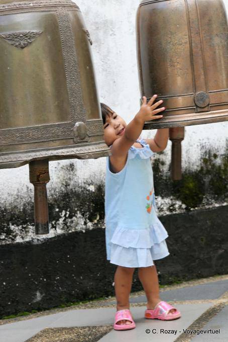 The little girl and bells, Wat Doi Suthep, Chiang Mai - Thailand
