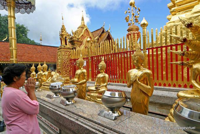 Female praying, Wat Doi Suthep, Chiang Mai - Thailand