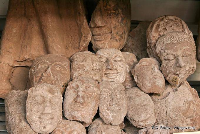 Pile of stone heads, Phra Sri Rattana Mahathat Wat, Phitsanulok - Thailand