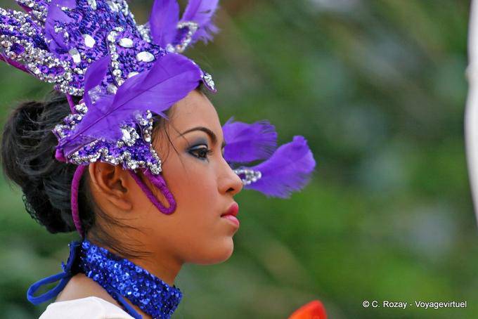The woman with purple feathers, Festival Patong, Phuket - Thailand