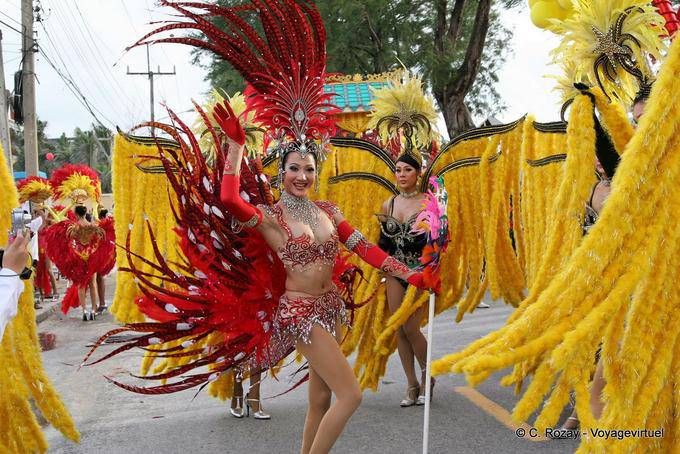 Dancer with red feathers, Festival Patong, Phuket - Thailand