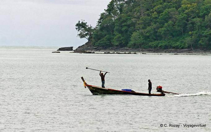 A fisherman in action, Phuket Town Gypsy - Thailand