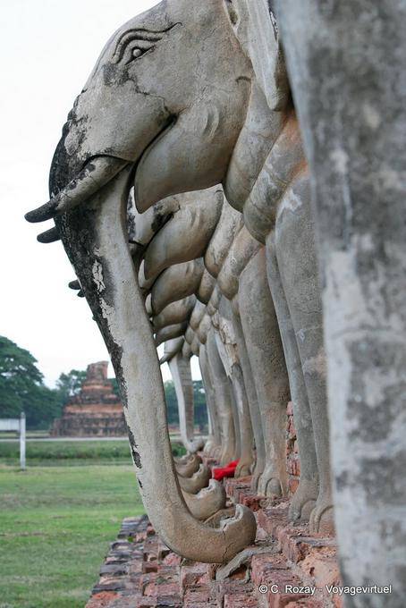 Elephants adorning the base of the chedi, Wat Chang Lom, Sukhothai - Thailand