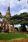 Grand chedi seen for garden, Wat Yai Chai Mongkol, Ayutthaya, Thailand.