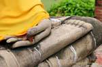Flowery hand on foot Buddha, Wat Yai Chai Mongkol, Ayutthaya, Thailand.
