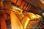Head leaning of the Reclining Buddha, Wat Pho, Bangkok, Thailand.