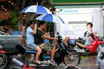 Umbrellas motorcycle, Chiang Mai, Thailand.