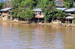 Houses in river, Chiang Mai, Thailand.