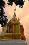 Chedi with a standing Buddha, Wat Sri Gerd, Chiang Mai Temple, Thailand.