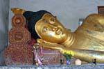The head of a reclining Buddha, Wat Chedi Luang, Chiang Mai, Thailand.
