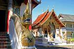 Naga and small viharn, Wat Chedi Luang, Chiang Mai, Thailand.