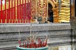 Chat and incense, Wat Doi Suthep, Chiang Mai, Thailand.