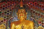 Smiling golden Buddha, Wat Doi Suthep, Chiang Mai, Thailand.