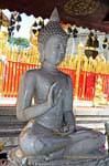 Buddha sitting in white marble, Wat Doi Suthep, Chiang Mai, Thailand.
