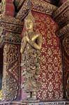 Golden statue praying, Wat Phra Singh, Chiang Mai, Thailand.