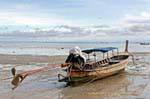 Long tail at low tide, Koh Phi Phi, Thailand.