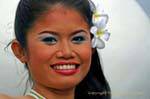 Girl with frangipani flower, Festival Patong, Phuket, Thailand.