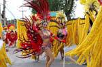 Dancer with red feathers, Festival Patong, Phuket, Thailand.