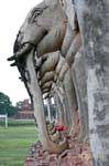 Elephants adorning the base of the chedi, Wat Chang Lom, Sukhothai, Thailand.