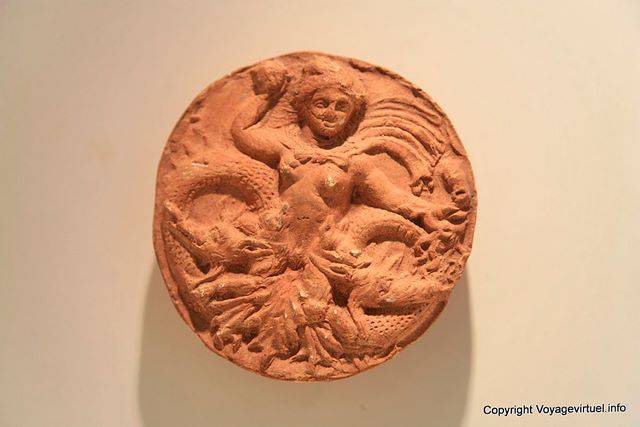 Kerkuane, Museum, round piece of terracotta representing the Medusa or the Hydra - Tunisia