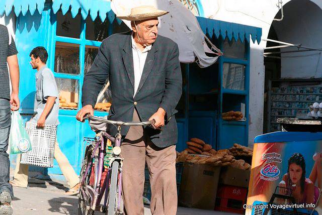 Man on bicycle, street Blacksmiths, Sfax - Tunisia