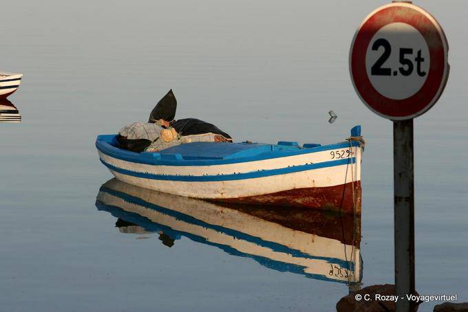 Boat on mirror panel, Ouled Kacem, Kerkennah - Tunisia