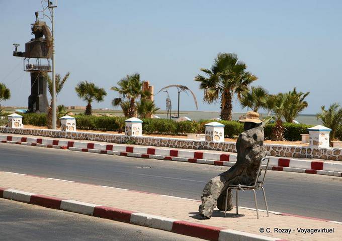 Sitting on the road in front of the plastic arts festival park Mahrès - Tunisia