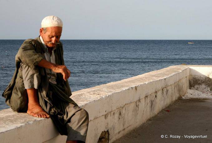 Old fisherman on the wall, Mahdia - Tunisia
