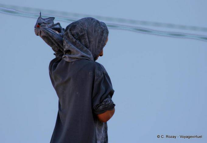 Matmata woman readjusting her scarf - Tunisia