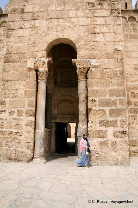 High, narrow entrance with ancient columns, Ribat of Sousse - Tunisia