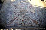 Dougga, red and blue mosaic of great decorative richness, Tunisia.