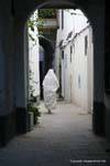 The woman in white, Tunis, Tunisia.