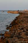 Volcanic rock coast towards bordj Jillil, Djerba, Tunisia.