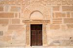 Small door at the foot of the minaret, Sidi Oqba Great Mosque, Kairouan, Tunisia.